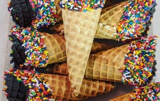 Chocolate dipped waffle cones with sprinkles