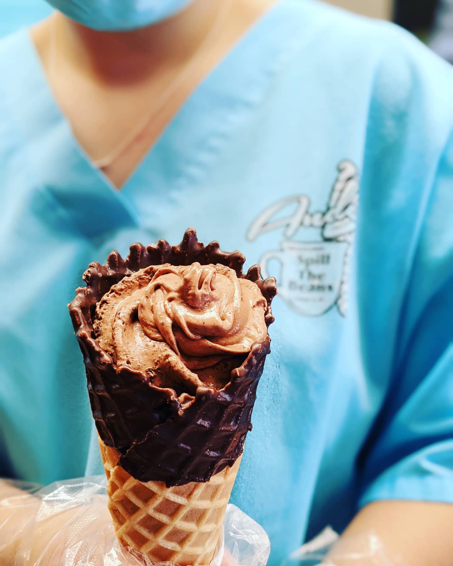Ice creams served in a chocolate dipped waffle cone