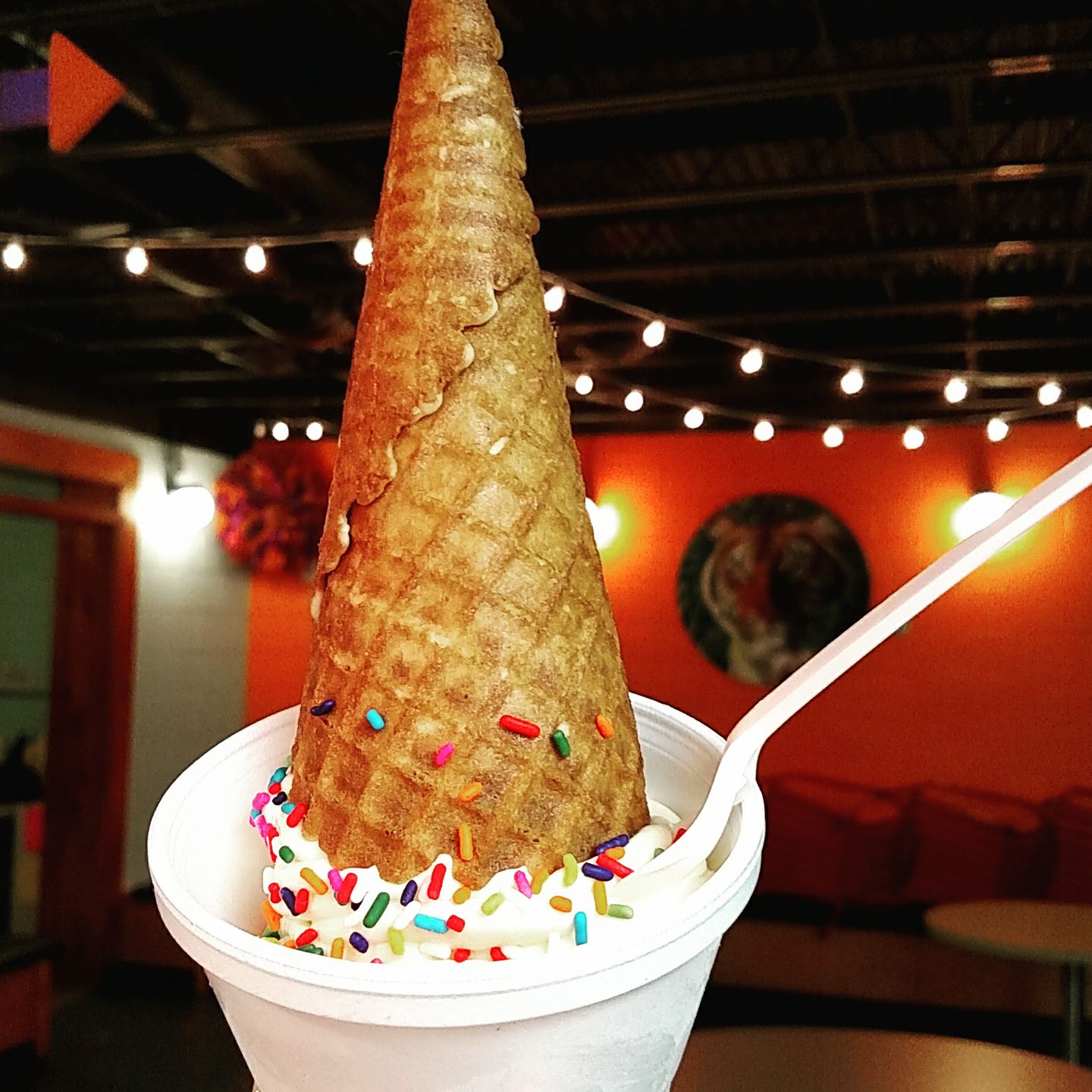 Waffle cone ice cream sprinkles in a cup